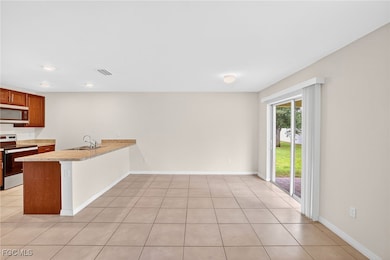 Kitchen with appliances with stainless steel finis