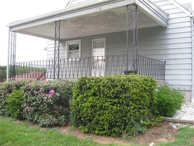 Exterior Front. SIDE PORCH