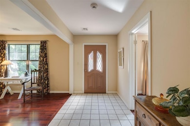 Entryway featuring tile