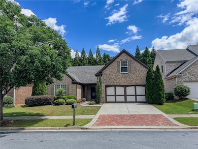 View of front of house featuring brick siding, con