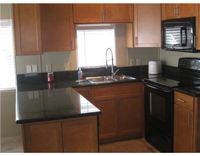 Kitchen. Enjoy the large breakfast bar, high end s