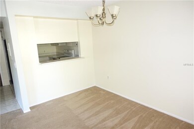 Dining area with pass-through window from kitchen