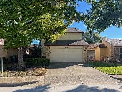 View of front of property featuring concrete drive