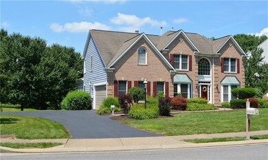 Two car attached garage, private wooded, level hom