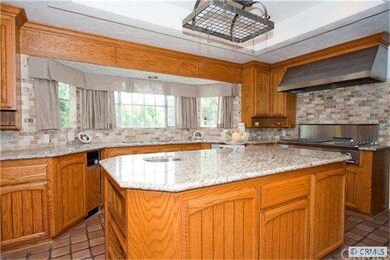 Granite counter tops, 6 burner stove, center islan