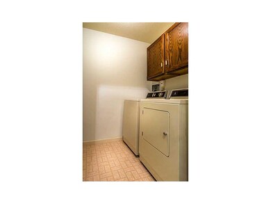 Laundry Area. Washer and dryer remain.