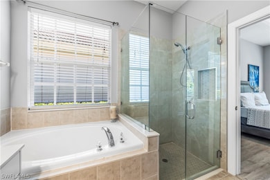 Main bathroom tub and shower.
