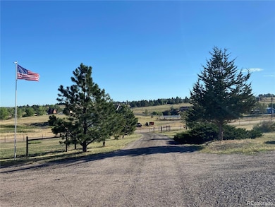 Tree lined entry with keypad gate