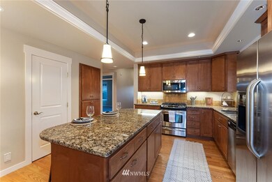Everyone wants to be sitting at a center island, wine in hand, chatting to the cook and helping chop or prepare a meal! This gourmet kitchen is functional and fun!