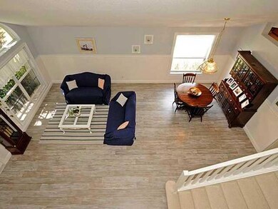 Exterior Front. Dining room with stairs and entrance to kitchen and family room