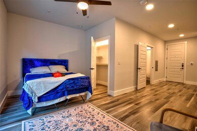 Space for queen bed and a small nightstand. Also, a big walk-in closet.