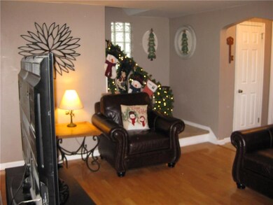 Formal Livingroom has hard wood floor,picture wind