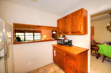 Kitchen with Pass Thru to Living Area