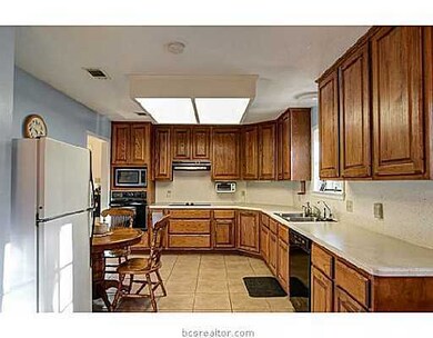 Kitchen. Lots of cabinets to this easy accessible