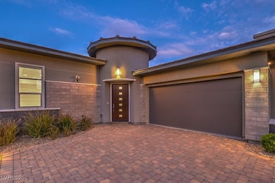 Doorway to property with stucco siding, an attache