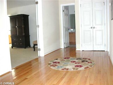 Other - Wide upstairs hallway has hardwood floorin