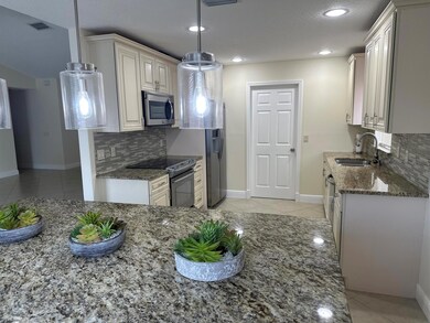 525 SW Halden Ave, Port Saint Lucie, FL 34953 - photo 2