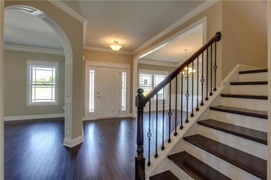 View of the Foyer, Formal Living Room, and Formal Dining Room