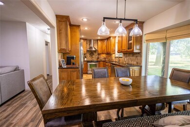 Dining and kitchen area has plenty of natural ligh