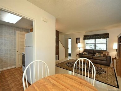From rear entry door, Eat-In Area, Kitchen, and Fa