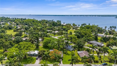 Aerial view of residential area with a nearby body