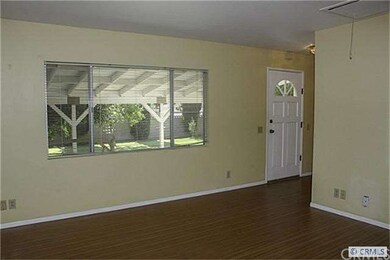 Guest house  Living Room with a view of yard.