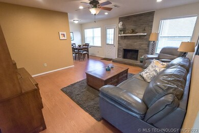 Laminate wood floor in living areas for easy care.