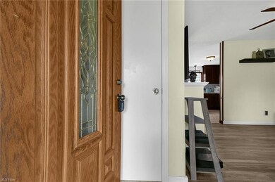 Foyer entrance with hardwood flooring
