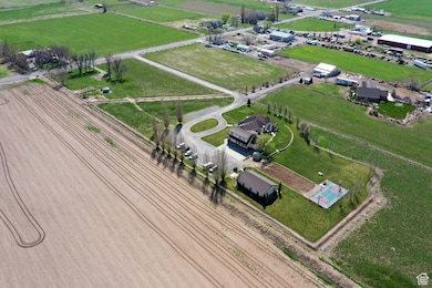 Birds eye view of property featuring a rural view