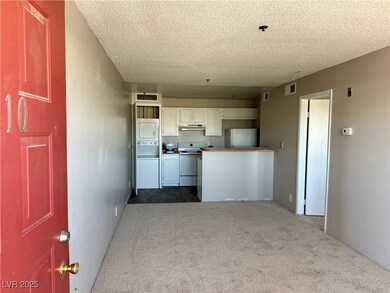 Kitchen with freestanding refrigerator, white elec