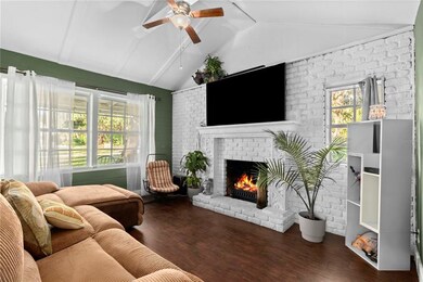 Living room with fireplace light and bright