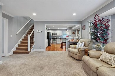 Family Room opens to kitchen and dining area
