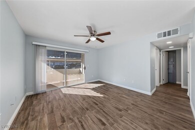 LIVING ROOM WITH COVERED PATIO