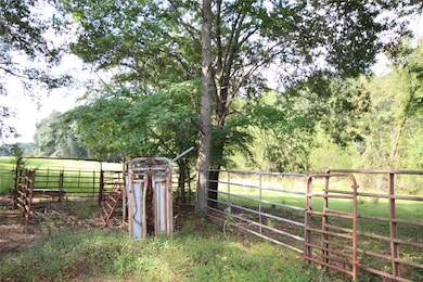 View of yard featuring a gate