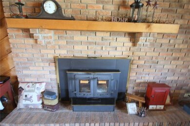 Cozy Fireplace  in this great room.