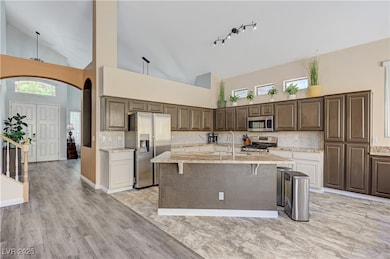 Kitchen with appliances with stainless steel finis