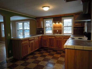Kitchen. Hickory cabinets, new flooring, tons of c