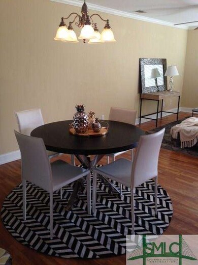 Stylish Dining room is part of the open concept pl