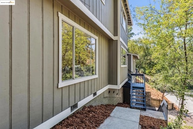 View of side of home featuring board and batten siding