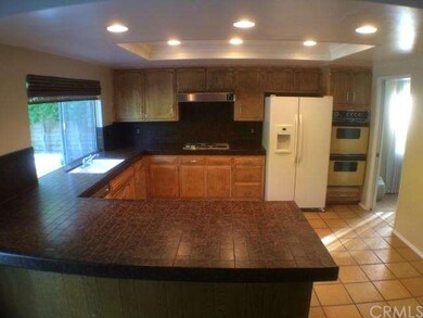 Another kitchen view, pantry is located to the rig