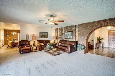 Family Room with Kitchen in the Background.