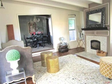 Wood beam ceilings accentuate the ceilings of ever