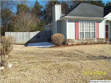 Left side view showing back yard fence