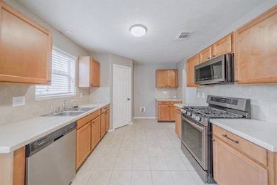 Large Kitchen w/Ample Cabinets & Counter Space + S