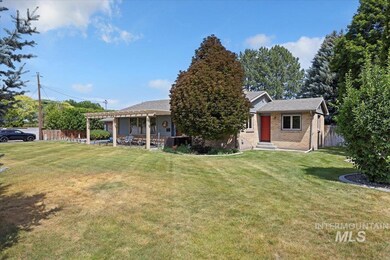 Single story home with brick siding