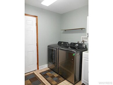 Laundry. 1st floor laundry room w/access to 2.5 ca
