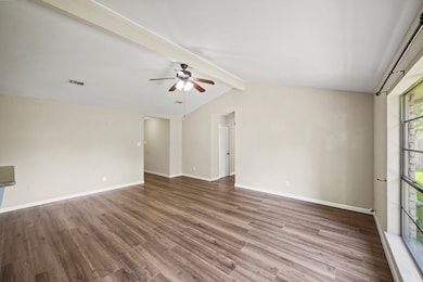 Large living area featuring recently installed lux
