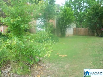 WOODEN FENCED BACKYARD