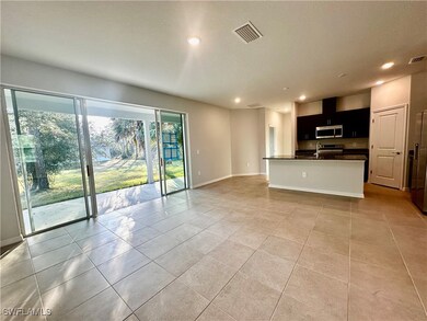 Unfurnished living room with light tile patterned