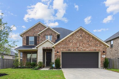 A daytime view of the front of the home. This Beazer home was completed in 2018 and boasts Beazer's highly effective spray insulation, which lowers demands and system requirements for your HVAC.